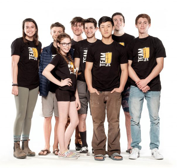 A group of youths wearing the Pad Climbing team's T-shirt